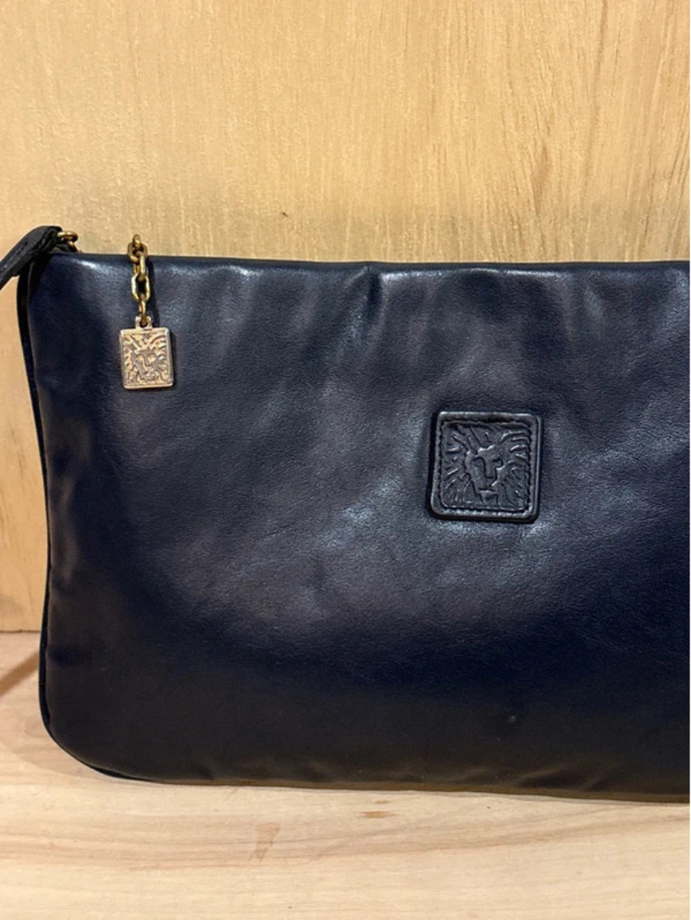 VTG 80s Anne Klein for Calderon Black Leather Crossbody Bag Clutch Lion Logo
